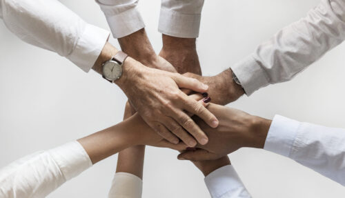 Business hands joined together teamwork